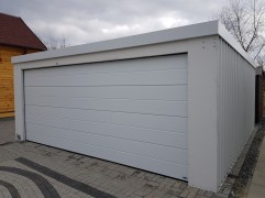 Assembled double garage with plaster and flat roof